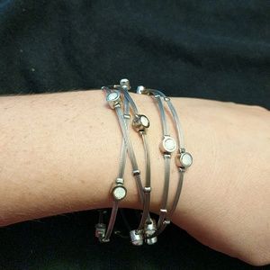 Cookie Lee stacked bracelets